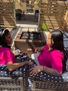 Attendees smiling and talking at a W2W gathering